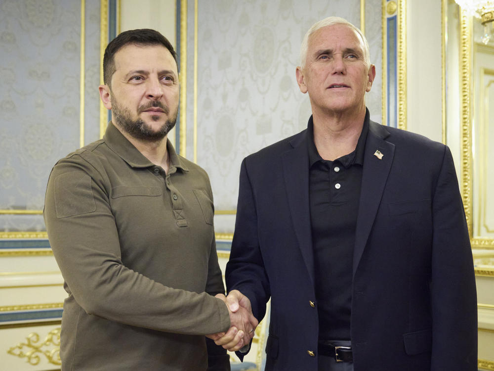 In this photo provided by the Ukrainian Presidential Press Office, Ukrainian President Volodymyr Zelenskyy, left, and former US Vice President Mike Pence pose for photo during their meeting in Kyiv, Ukraine, Thursday, June 29, 2023. (Ukrainian Presidential Press Office via AP)