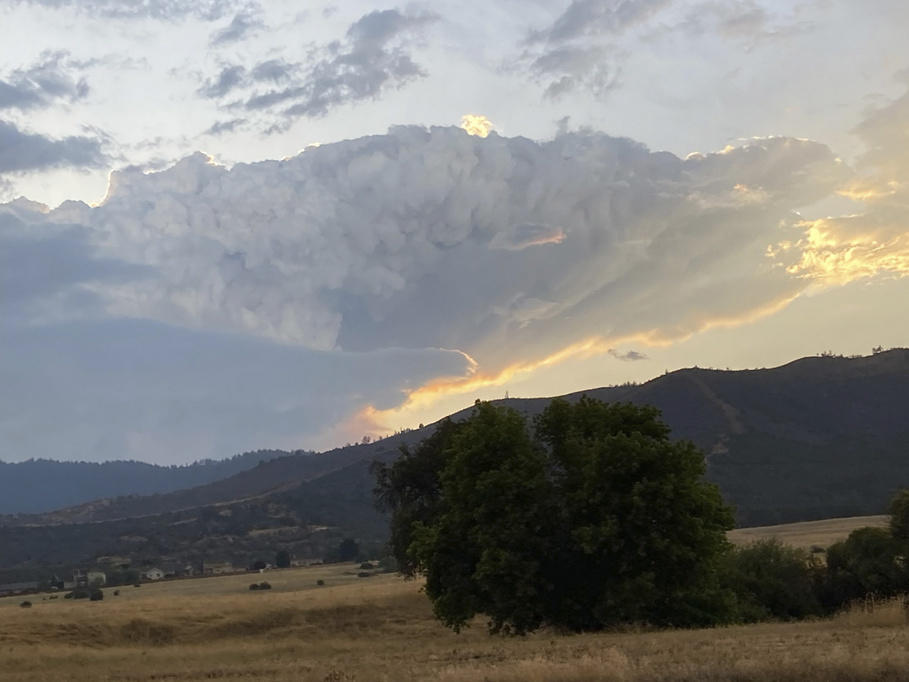 Smoke rises from the Head Fire in Klamath National Forest, Calif., on Tuesday Aug. 15, 2023.