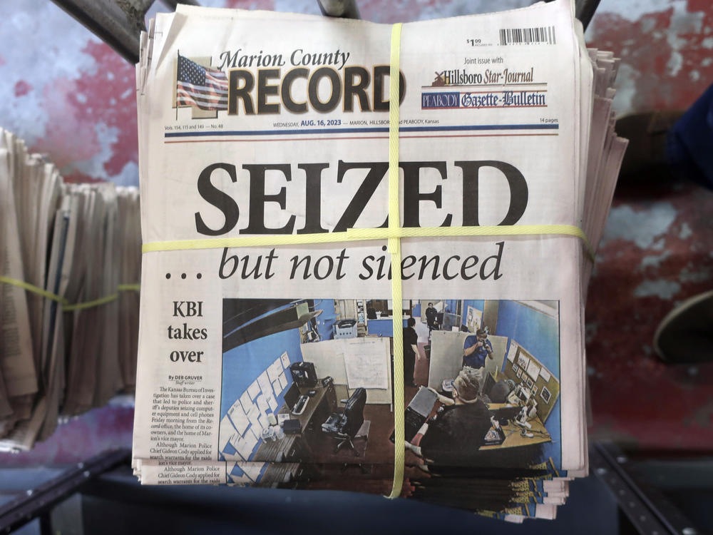 A stack of the latest edition of the weekly Marion County Record sits in the back of the newspaper's building in Marion, Kansas, on Wednesday. The newspaper's front page was dedicated to two stories about a raid by local police on its offices and the publisher's home on Aug. 11.