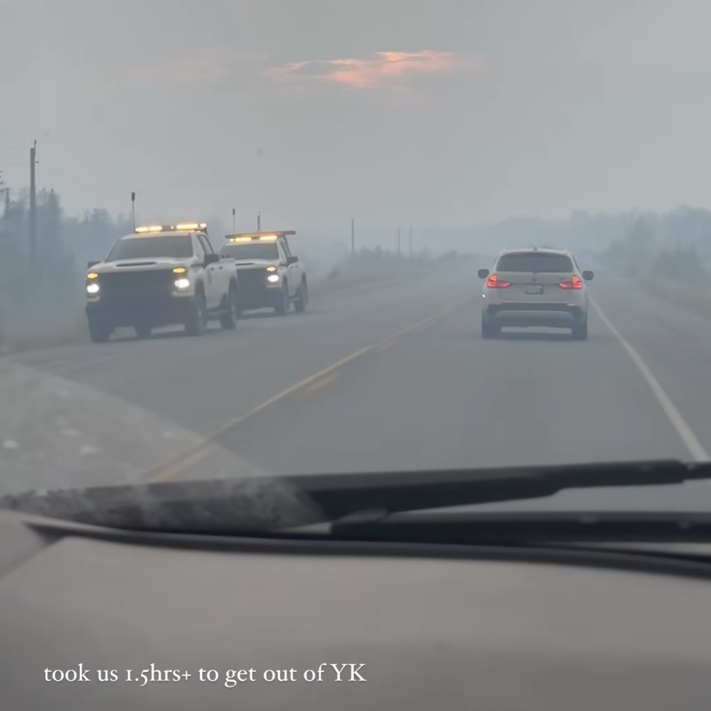 A screenshot of the fires from Instagram user Kimberly Benito shows evacuees traveling by car through highways engulfed in smoke.
