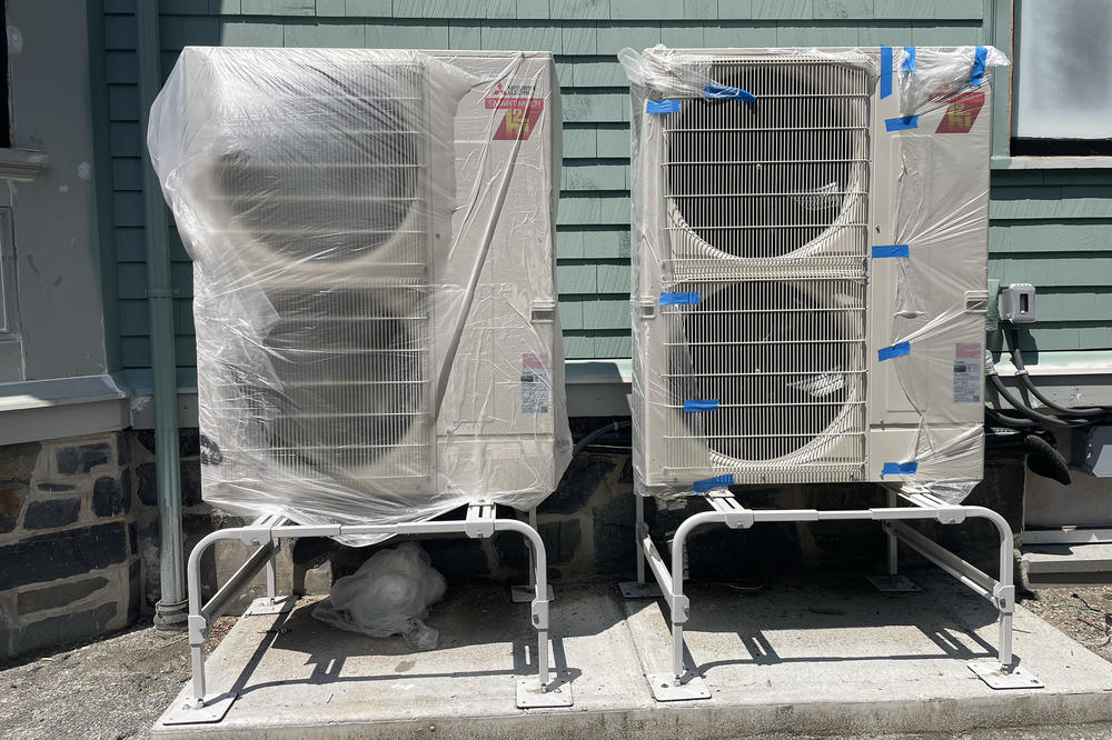 Heat pumps, which bring warm or cool air into the home, are more energy efficient than traditional HVAC systems and improve air quality. Macomber was installing these as part of his overhaul of his house in Cambridge.