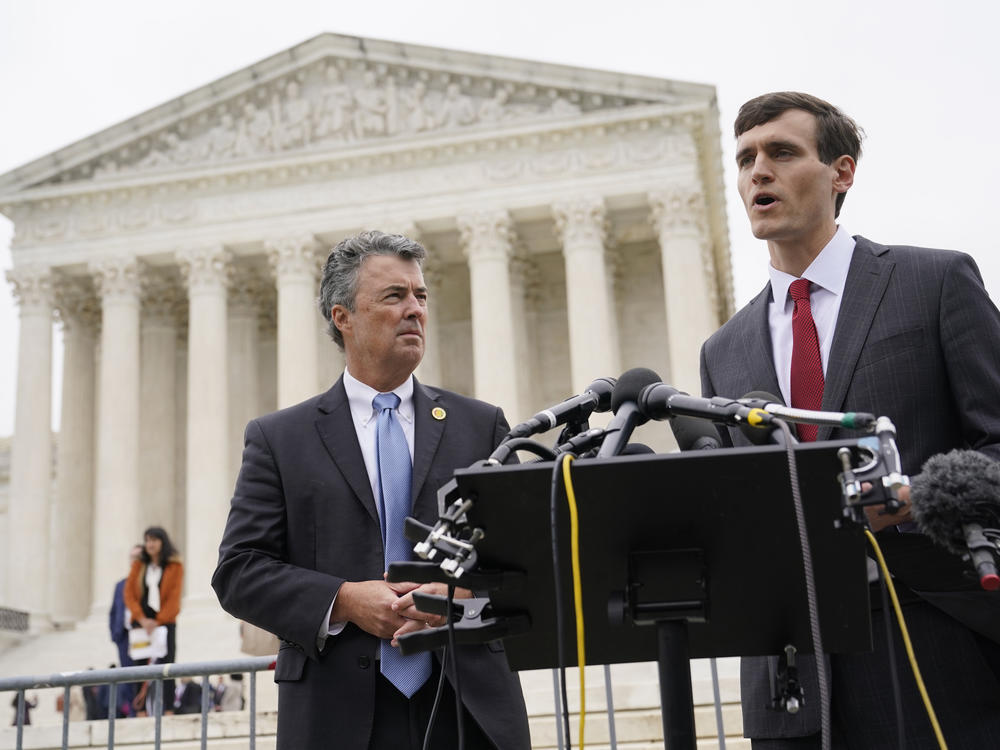 Alabama Solicitor General Edmund LaCour (right) speaks alongside Alabama Attorney General Steve Marshall after oral arguments in an Alabama congressional redistricting case outside the U.S. Supreme Court in Washington, D.C., in 2022.