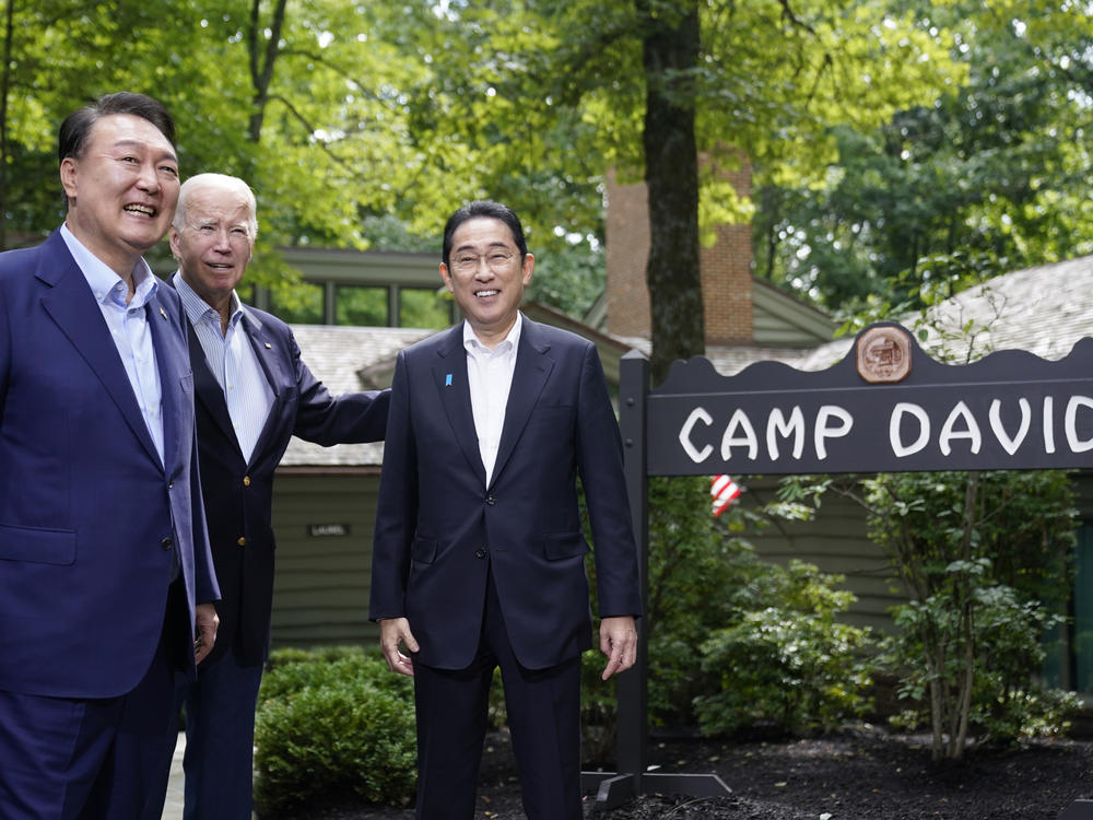 South Korea's President Yoon Suk Yeol, left, President Joe Biden and Japan's Prime Minister Fumio Kishida, right, meet on Fri, Aug. 18, 2023, at Camp David.