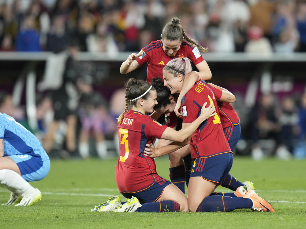 Spain teammates celebrate their victory over England in the final of the Women's World Cup at Stadium Australia in Sydney, Australia, on Sunday.
