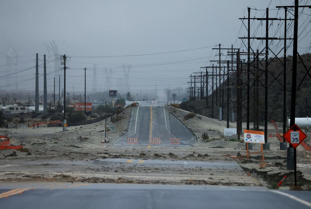 Sun., Aug. 20: A road is washed out as Tropical Storm Hilary heads north into Palm Springs, California.