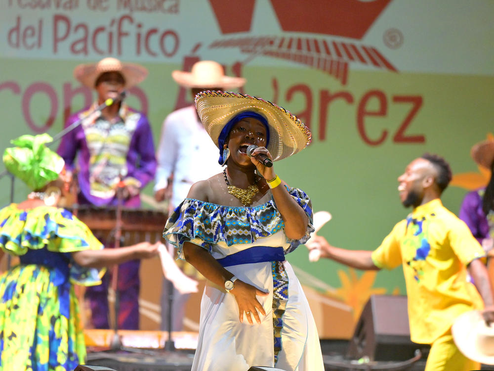 Nearly 500,000 people gathered in Cali, Colombia for the 27th annual Petronio Alvarez Festival. Nidia Góngora and her group Canalón de Timbiquí performed on the main stage.