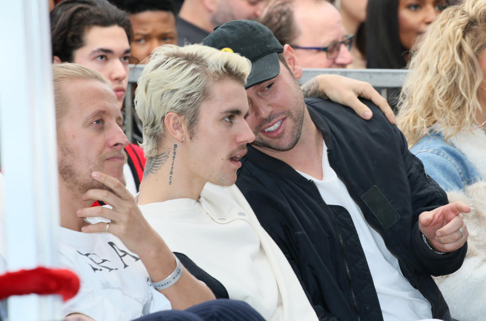 Justin Bieber (left) and Scooter Braun at a Hollywood Walk of Fame event in January 2020.