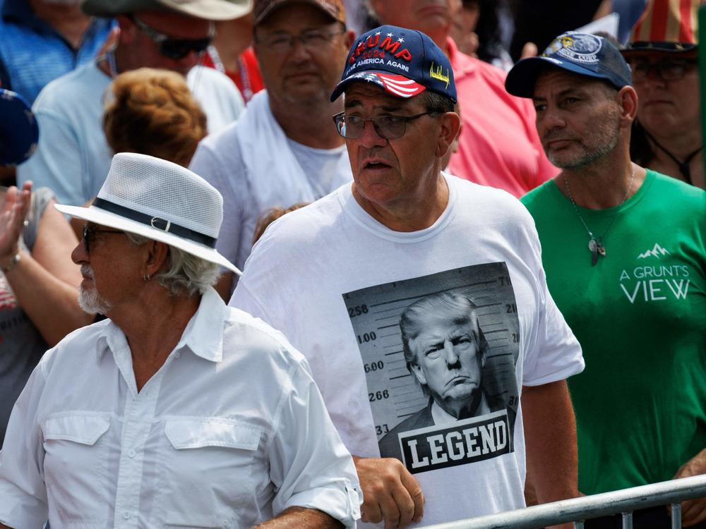 A shirt displaying a fake mug shot of the former president and 2024 presidential candidate Donald Trump is seen during a campaign rally in Pickens, S.C., in July.