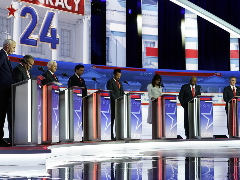 From left, former Arkansas Gov. Asa Hutchinson, former New Jersey Gov. Chris Christie, former Vice President Mike Pence, Florida Gov. Ron DeSantis, businessman Vivek Ramaswamy, former U.N. Ambassador Nikki Haley, Sen. Tim Scott, R-S.C., and North Dakota Gov. Doug Burgum before a Republican presidential primary debate hosted by Fox News Channel Wednesday in Milwaukee.