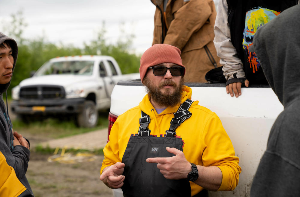 Barron Sample, principal of the Akiachak School, prepares to take students out drift netting.