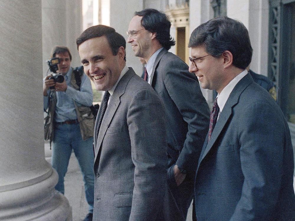 Then-U.S. Attorney Rudolph Giuliani (left) with Ronald Goldstock (right), director of the State Organized Crime Task Force, and trial lawyer Barry Slotnick, before speaking at a forum on organized crime in New York on March 13, 1986.