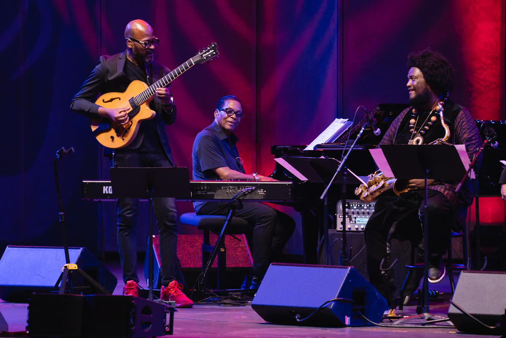 <em></em>Herbie Hancock, flanked by guitarist Lionel Loueke and saxophonist Kamasi Washington, leads one of many all-star performances at 