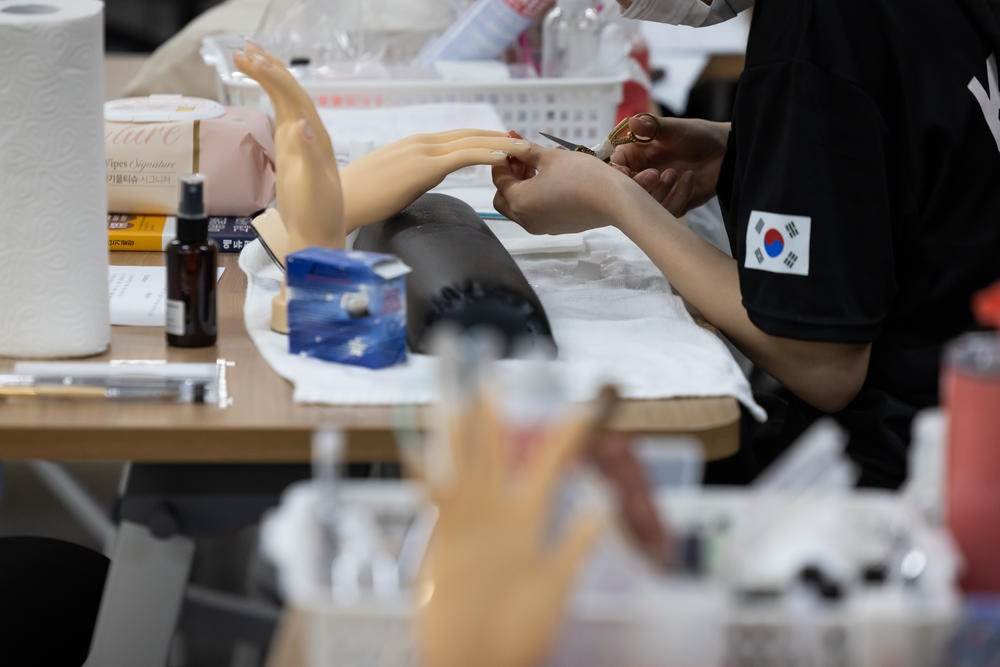 A North Korean defector at a nail art class at the Anseong Hanawon center, July 10.