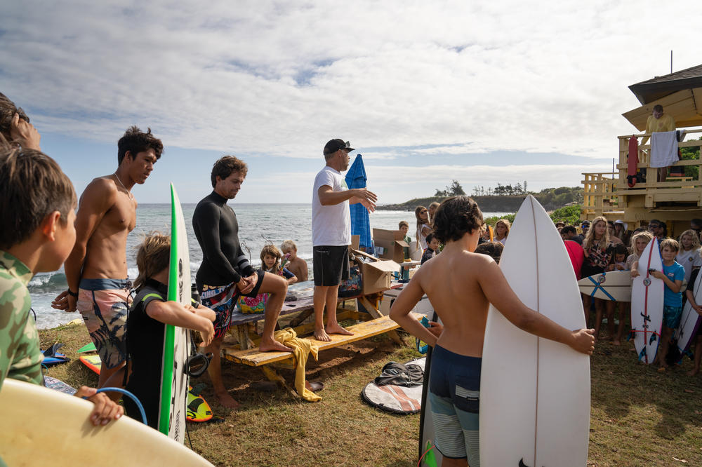 Pedro Robalinho, center, and his wife Rafaela Muniz organized the session. The couple lost everything in the fire. At the beginning of the event, Robalinho called together the group that included Alms and other pro surfers from Maui: Kai Lenny, Imaikalani Devault, Cody Young, Jackson Bunch, Summer Macedo and Annie Reickert. They all held hands and had a moment of silence.