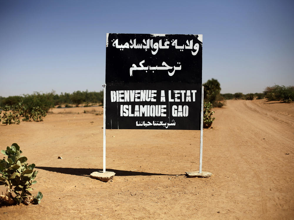 A sign on the northern road exiting in Gao, Northern Mali, reads 