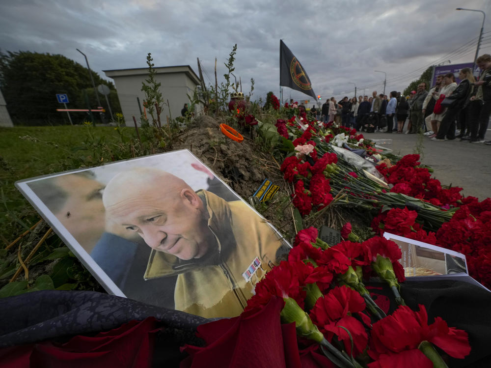 A portrait of the late owner of private military company Wagner Group Yevgeny Prigozhin sits at an informal memorial next to the former the group's headquarters in St. Petersburg, Russia, Aug. 24.