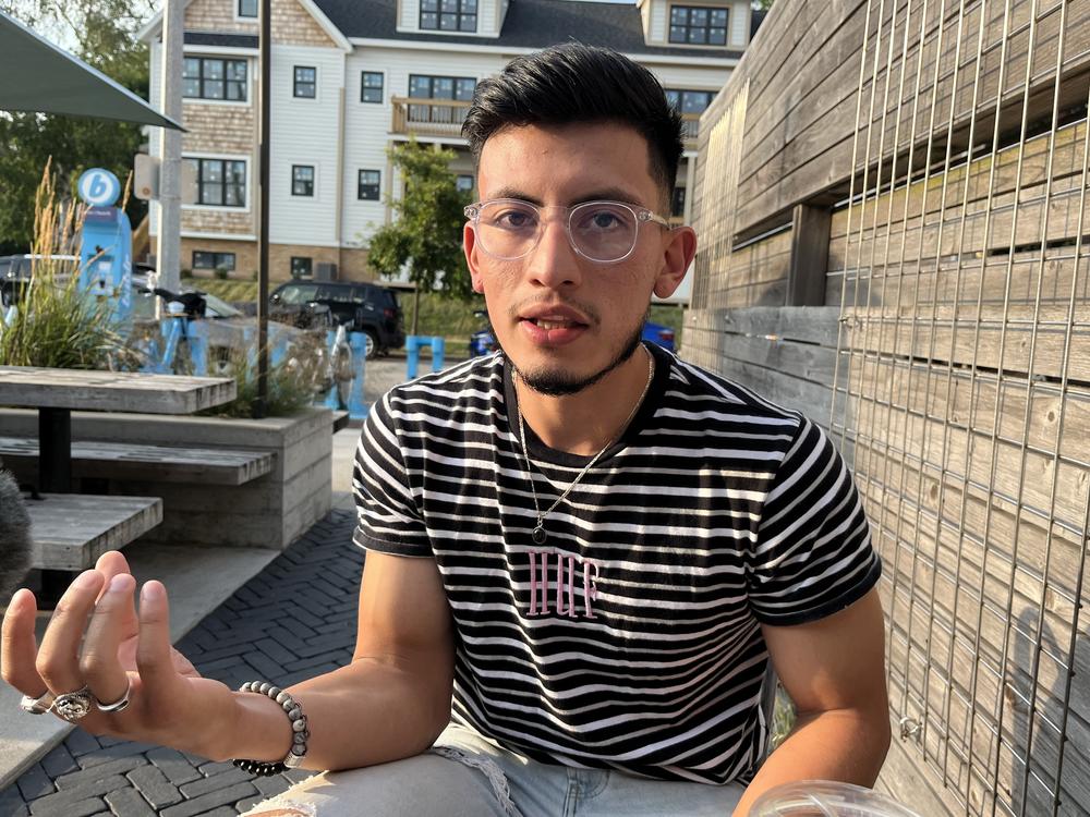 Mario Juarez, a student and small business owner, talks about his changing politics in Milwaukee on August 21.