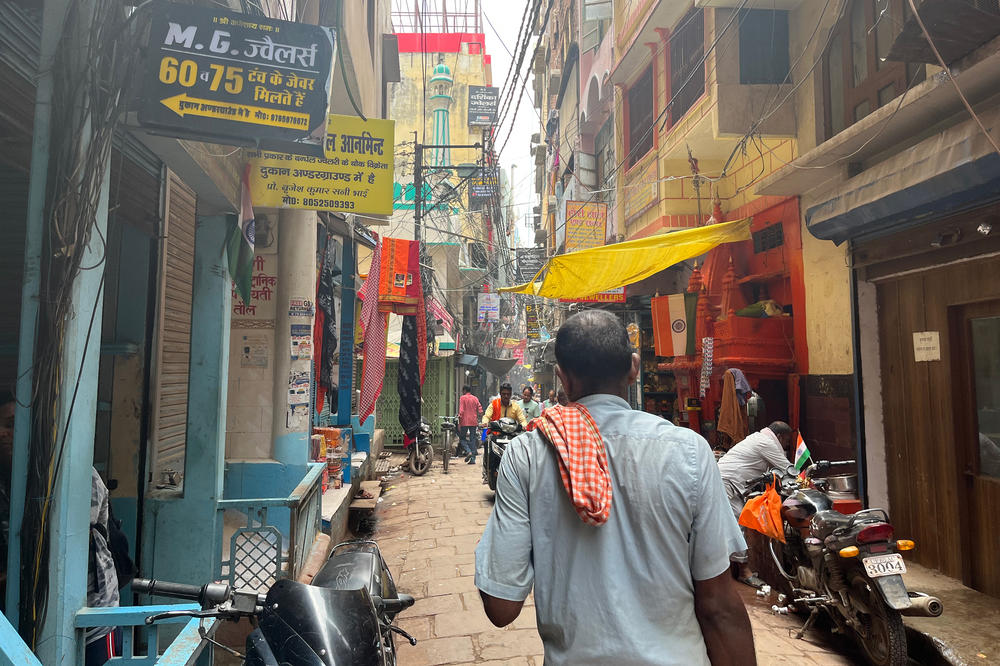 A narrow lane in northern India's Varanasi or Banaras, as it's also called. The city is the epicenter of Hinduism but is a mixture of different cultures and faiths.