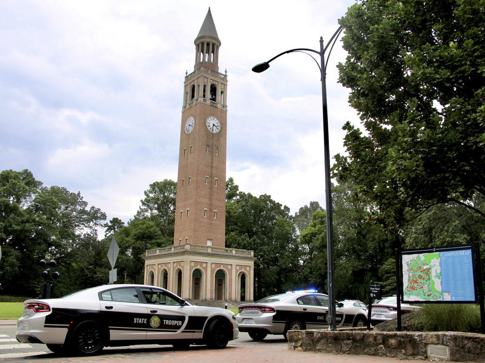 Law enforcement respond to the University of North Carolina at Chapel Hill campus on Monday after the university locked down and warned of an armed person on campus.