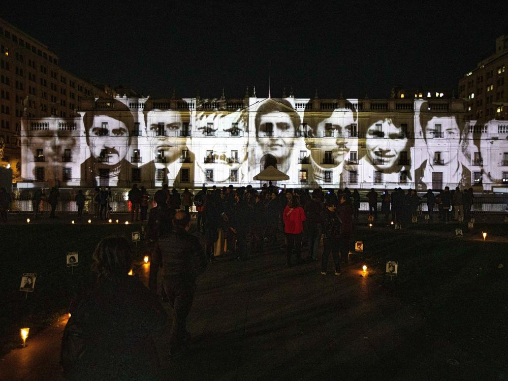 A view of the images portraying victims of the Augusto Pinochet dictatorship projected onto the La Moneda Presidential Palace to mark the commemoration of the International Day of the Disappeared in Santiago, Chile, on Wednesday.