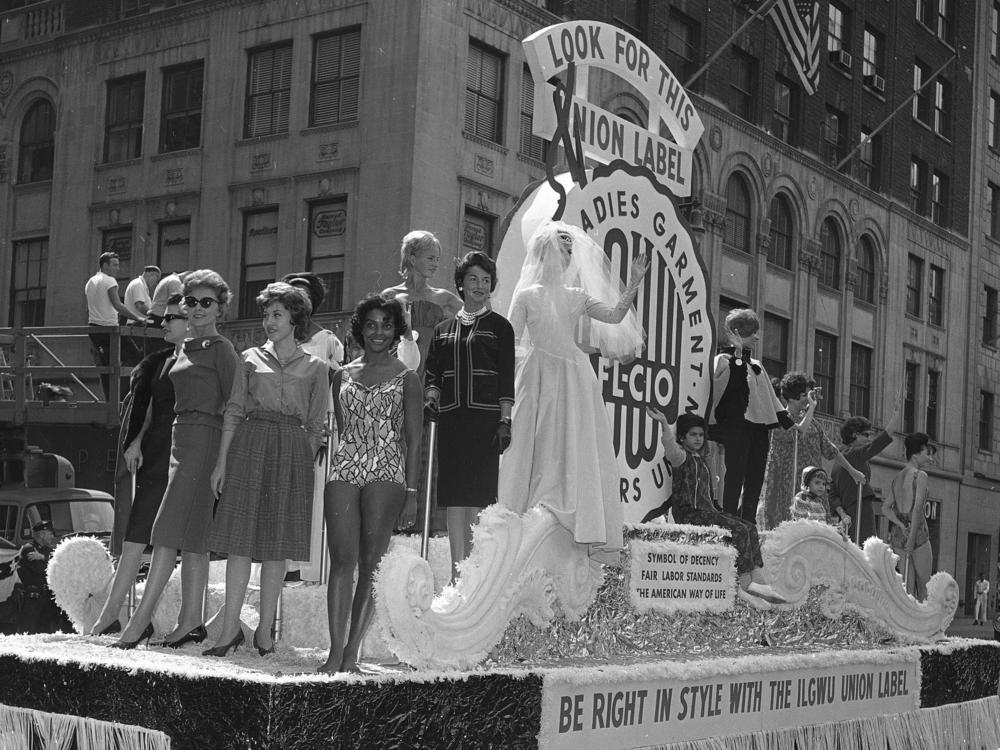 Members of the International Ladies' Garment Workers' Union are seen on a Labor Day parade float, Sept. 4, 1961. While many may associate the holiday with major retail sales and end-of summer barbecues, Labor Day's roots are in worker-driven organizing.