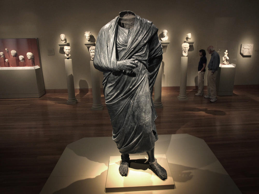 A Roman-era statue, thought to represent Marcus Aurelius, stands in a gallery at the Cleveland Museum of Art on June 25, 2010.