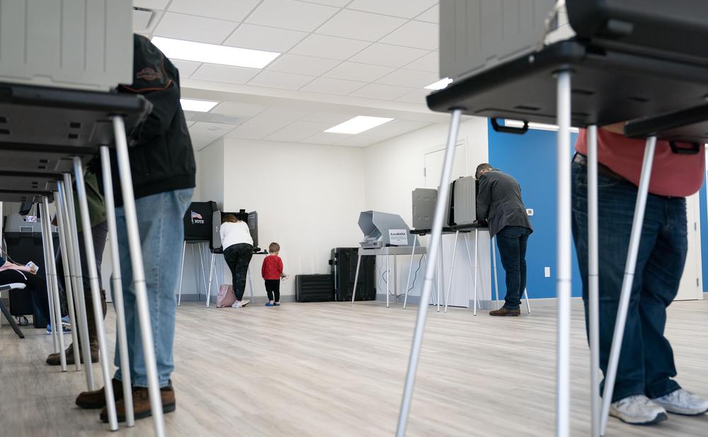 People vote at a polling place on Nov. 8, 2022, in Fuquay-Varina, N.C.