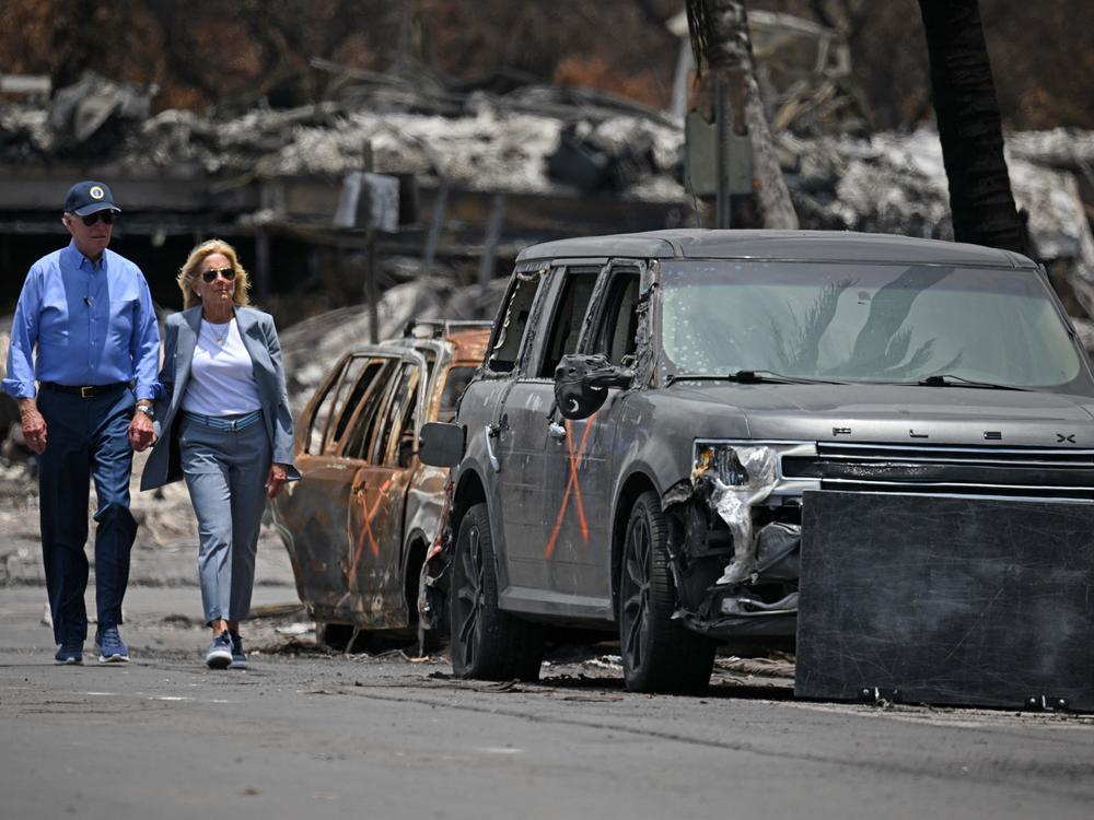 President Biden and first lady Jill Biden view damage caused by wildfires in Lahaina, Hawaii on August 21, 2023. The president is expected to travel to see hurricane damage Florida on Saturday.