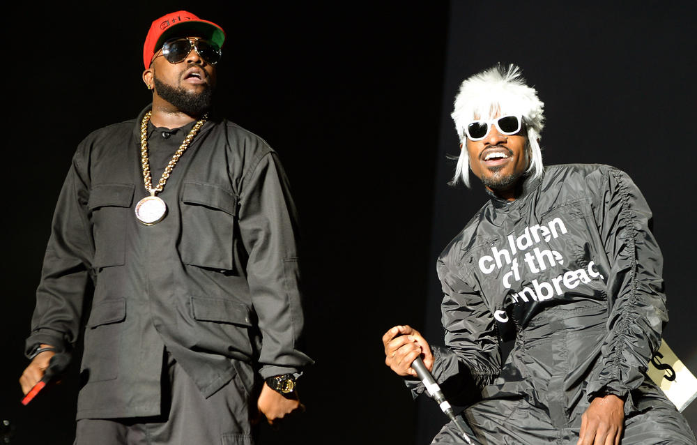 Big Boi (L) and Andre 3000 of Outkast perform onstage during day 3 of the Firefly Music Festival on June 21, 2014 in Dover, Delaware.