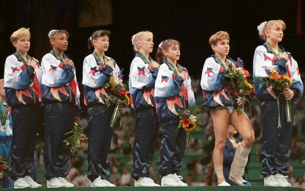 The 1996 U.S Olympic women's gymnastics team, left to right: Amanda Borden, Dominique Dawes, Amy Chow, Jaycie Phelps, Dominique Moceanu, Kerri Strug and Shannon Miller.