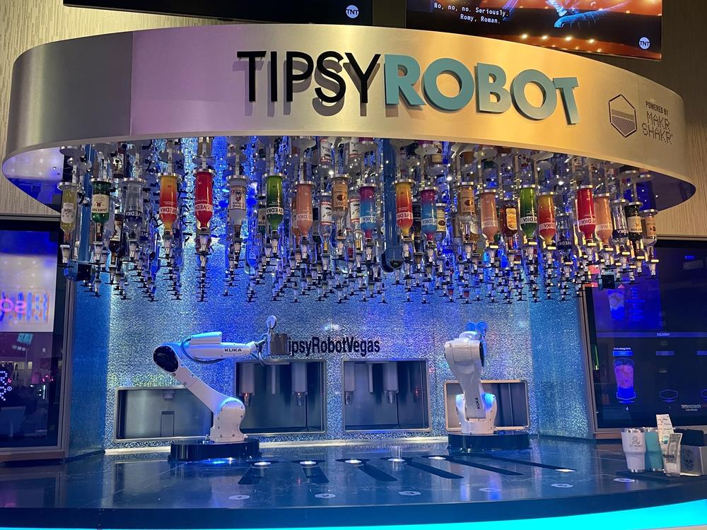 This bar inside Planet Hollywood on the Las Vegas strip has two robots that serve customers drinks. The Tipsy Robot opened a second location on the strip this year.