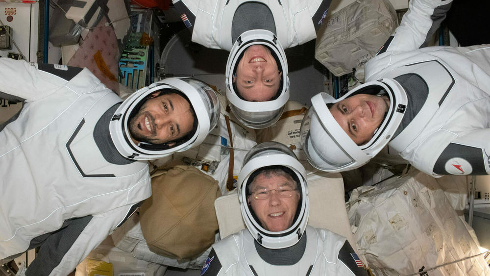 The four members of Crew-6 aboard the International Space Station pose for a portrait in their pressure suits. Clockwise from bottom, are NASA astronaut Stephen Bowen; United Arab Emirates astronaut Sultan AlNeyadi; NASA astronaut Woody Hoburg; and Russian cosmonaut Andrey Fedyaev.