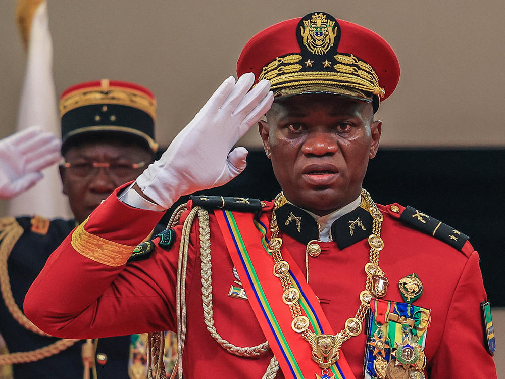 Gen. Brice Oligui Nguema salutes as he is inaugurated as Gabon's interim president, in Libreville, Monday.
