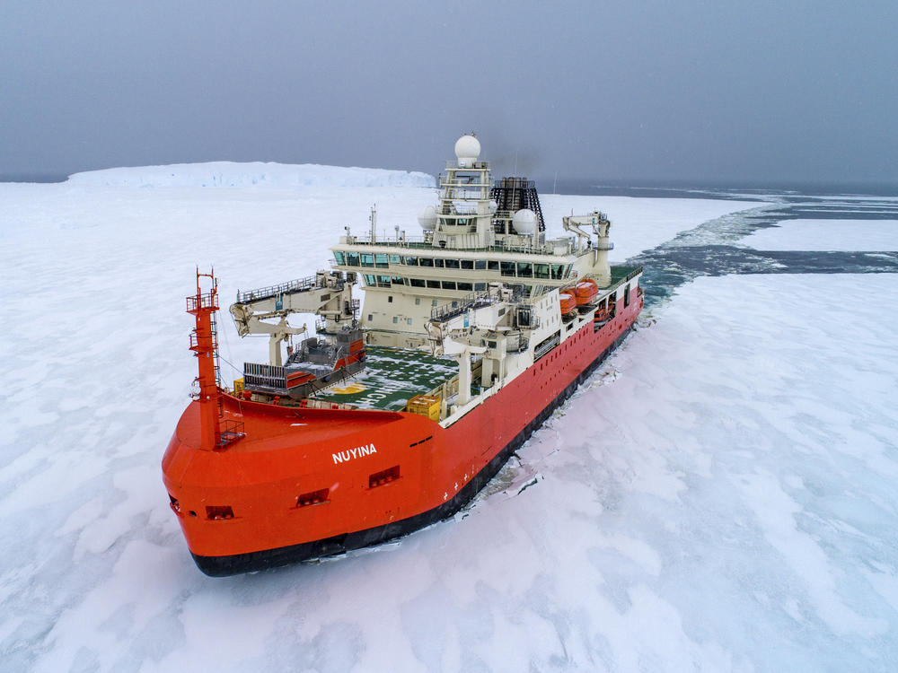 In this undated photo provided by the Australian Antarctic Division, the icebreaker RSV Nuyina is photographed from the air. An Australian who fell ill at the remote Casey research station is returning home on the RSV Nuyina following a mission to rescue him, authorities said Tuesday, Sept. 5, 2023.