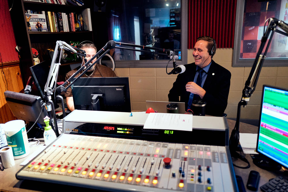 Wahl, 37, sits for a radio interview at WVNN in Athens, Ala. 