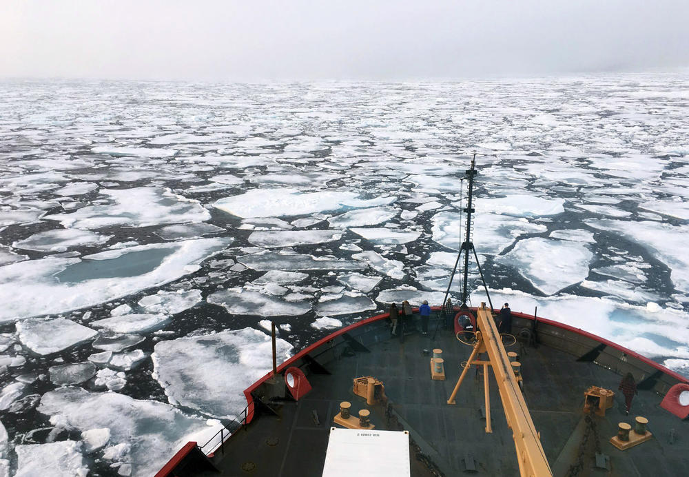 This summer 2018 file photo provided by the National Oceanic and Atmospheric Administration shows the U.S. Coast Guard Icebreaker Healy on a research cruise in the Chukchi Sea of the Arctic Ocean. The National Petroleum Reserve-Alaska borders the Chukchi Sea to the west.