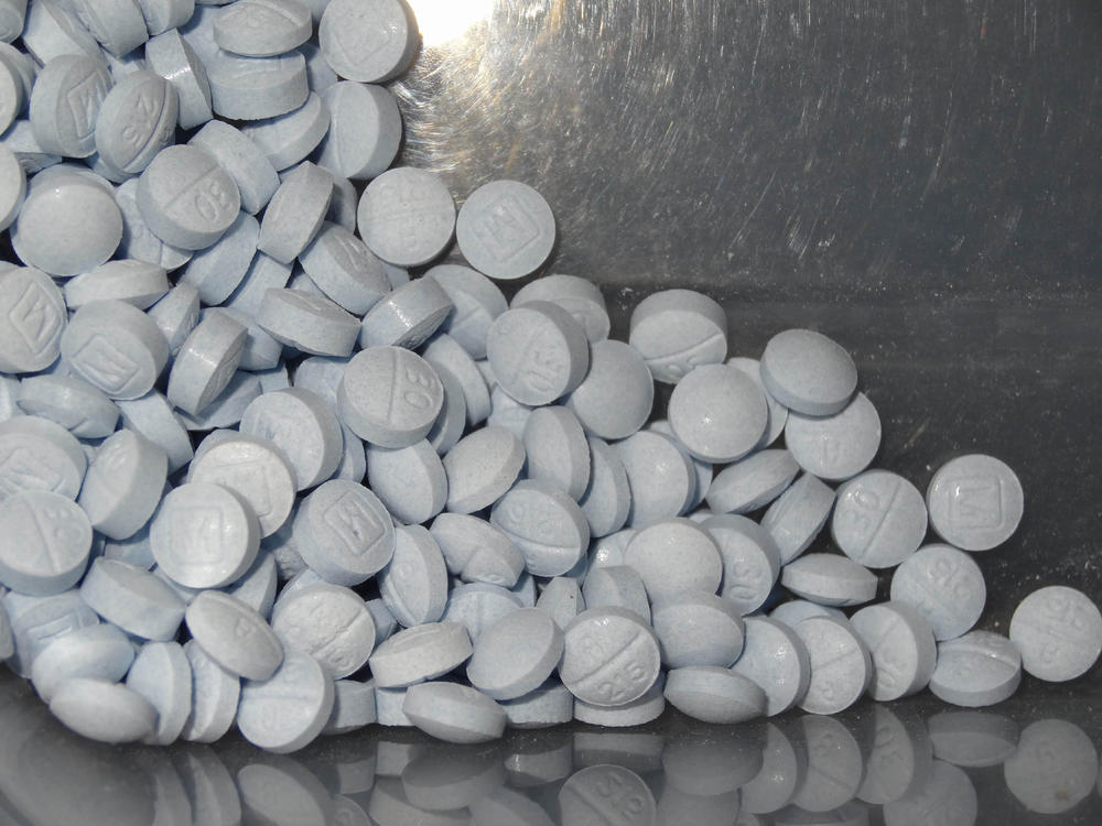 This photo provided by the U.S. Attorneys Office for Utah and introduced as evidence in a 2019 trial shows fentanyl-laced fake oxycodone pills collected during an investigation.
