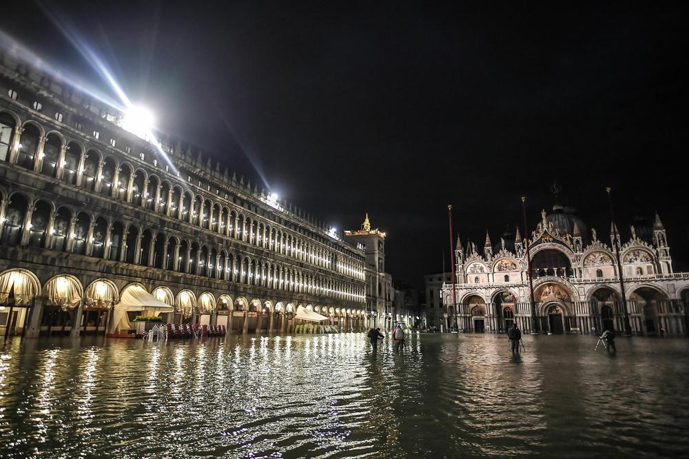 The flooded Piazza San Marco square, with the San Marco Basilica are pictured during a high tide water level on Nov. 12, 2019 in Venice.