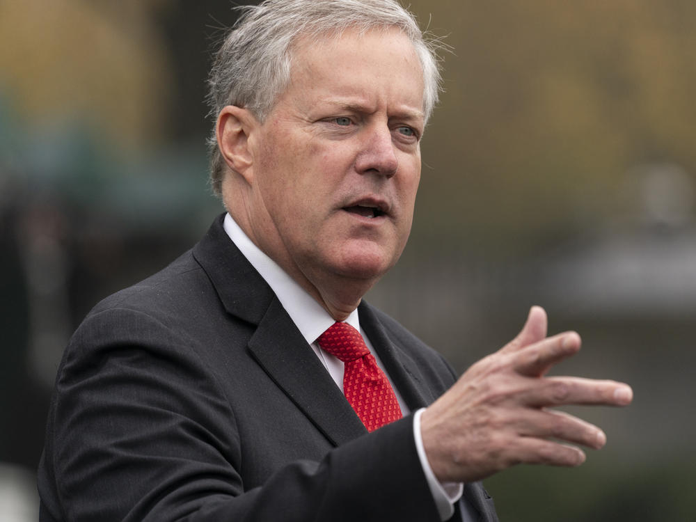 White House chief of staff Mark Meadows speaks with reporters at the White House, Oct. 21, 2020, in Washington. He is one of 19 defendants in a Georgia racketeering case involving former President Donald Trump.