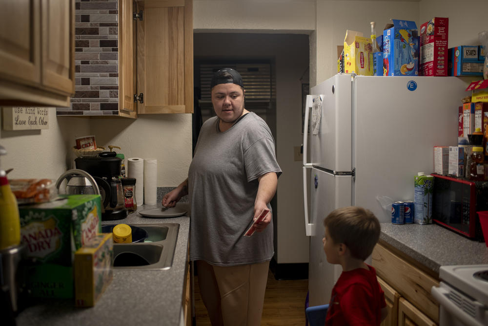 Kayce Atencio, who has been shadowed by medical debt for most of his adult life, recently moved into an apartment in Denver reserved for families at risk of homelessness. The small unit, which he shares with his school-age son and daughter, represents a new start, he says: 