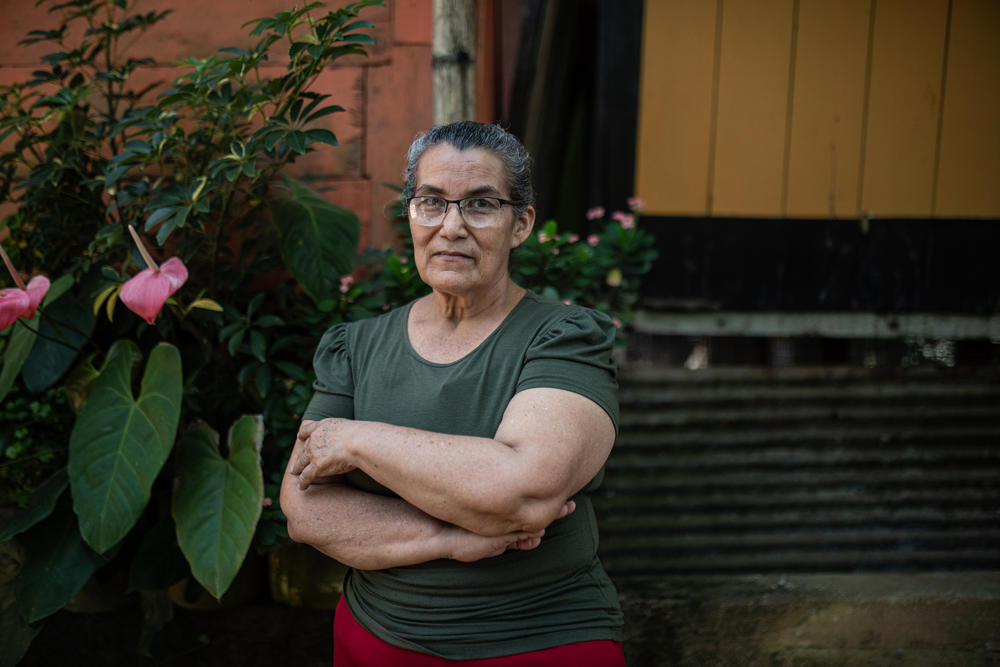 Daisy Díaz is waiting for the mayor to make good on his promise to pave the muddy street that runs in front of her house.