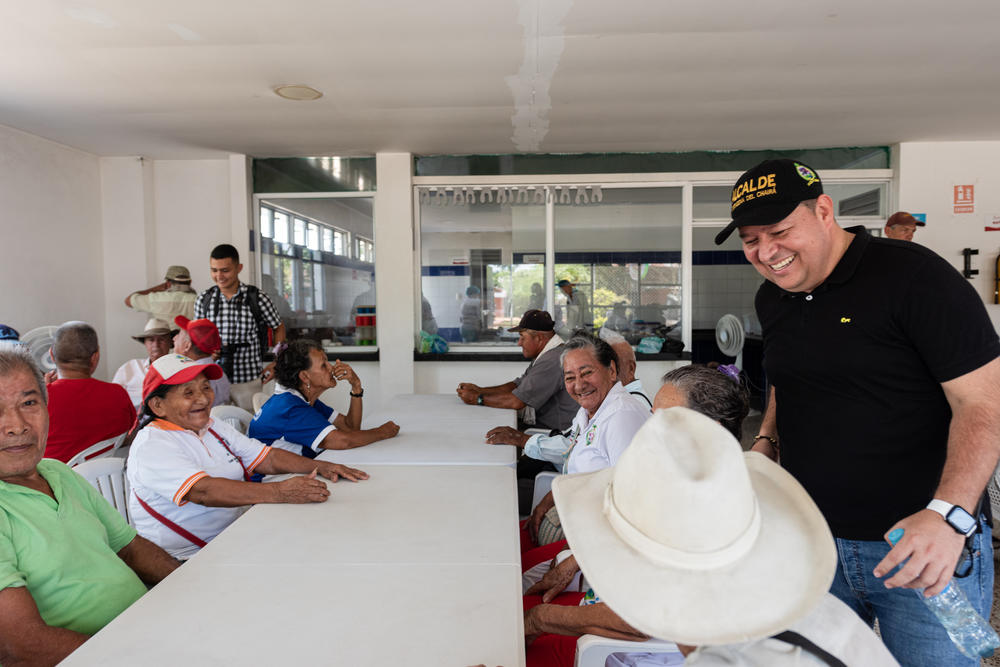 Because he leaves office on Jan. 1, Molina crams as many meetings and events into his schedule as possible, including this visit to a soup kitchen for the elderly.