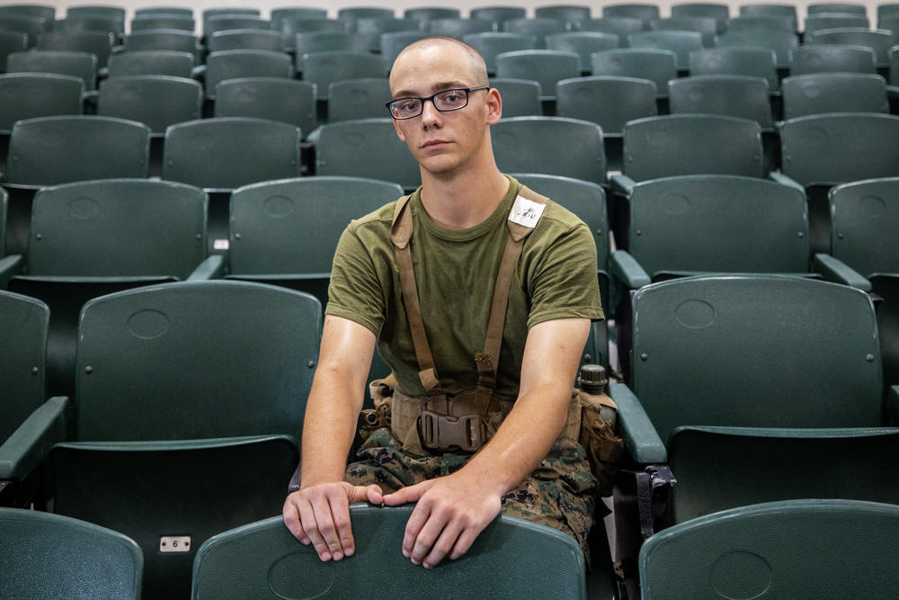 Private 1st Class Jake Mckay poses for a photo inside the auditorium he has history class with other recruits in Fox Company 2nd Recruit Training Battalion at Marine Corps Recruit Depot.
