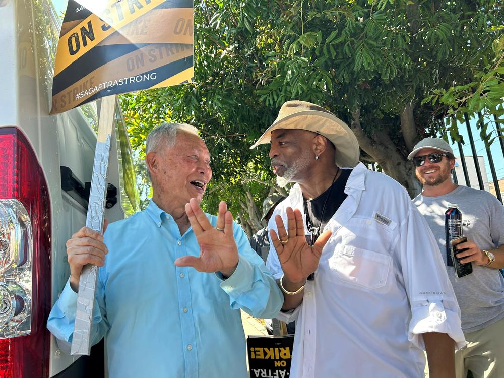 <em>Star Trek</em>'s George Takei and LeVar Burton on strike outside Paramount Pictures