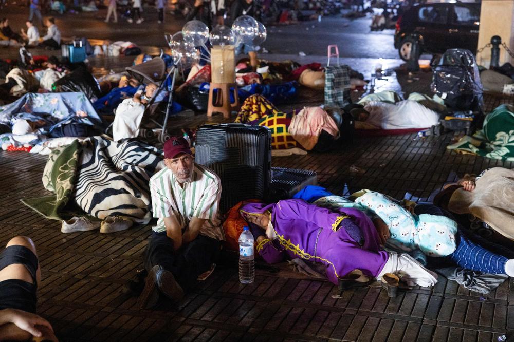 Residents take shelter outside at a square following an earthquake in Marrakesh.