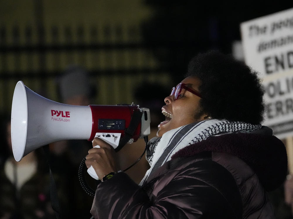 Amber Sherman speaks as protesters gather Friday, Jan. 27, 2023, in Memphis, Tenn., prior to a release of police video depicting five Memphis officers beating Tyre Nichols, whose death resulted in murder charges and provoked outrage at the country's latest instance of police brutality.
