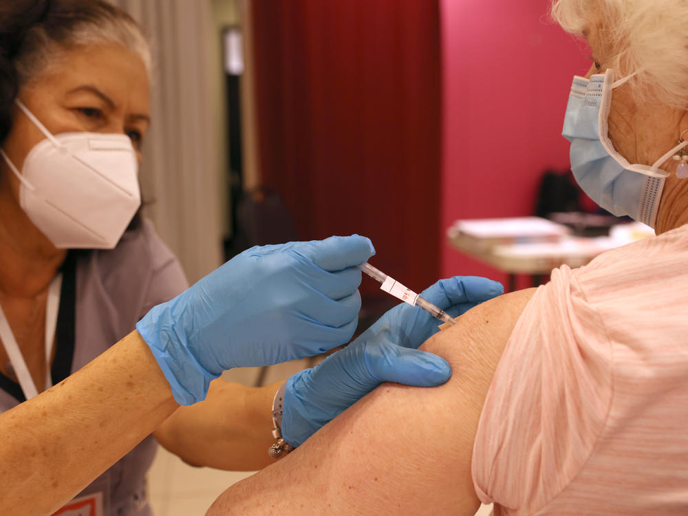 Another round of COVID-19 vaccines is on the way. The Food and Drug Administration approved vaccines from Pfizer and Moderna that target an omicron subvariant called XBB.1.5. Vaccination campaigns, like this one in San Rafael, Calif., in 2022, could resume soon.