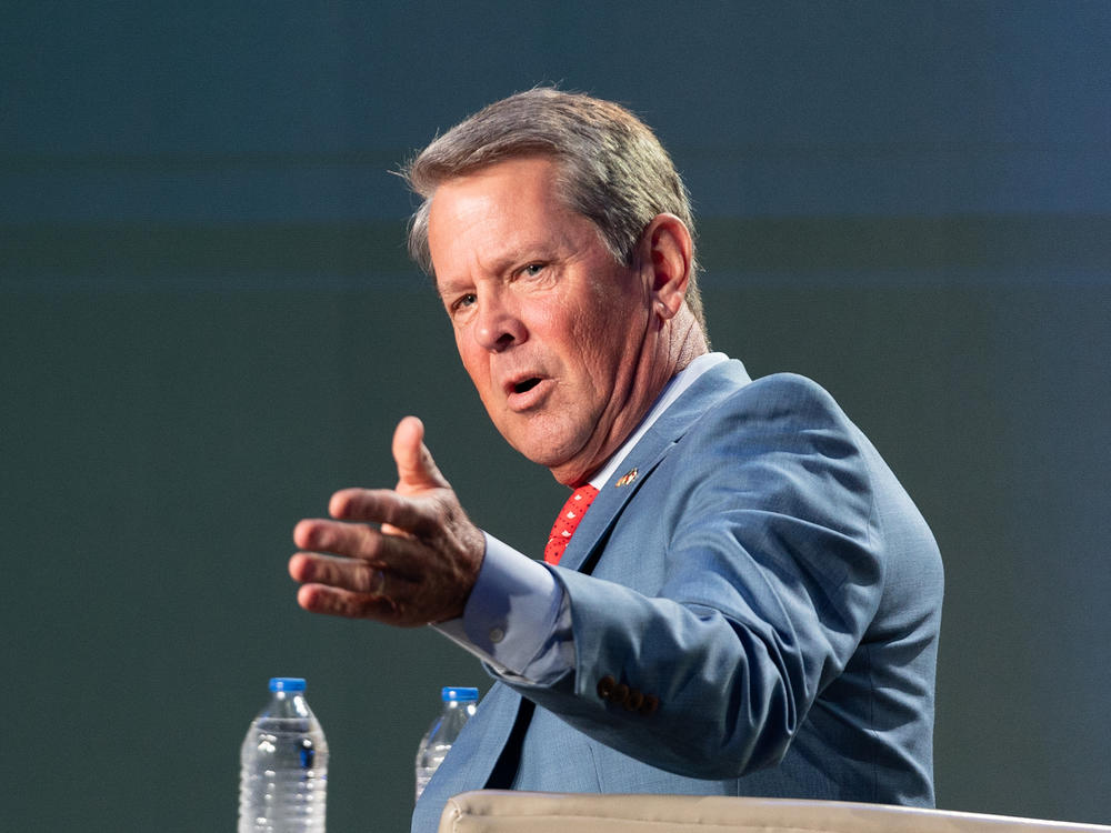 Republican Georgia Gov. Brian Kemp speaks at an event hosted by conservative radio host Erick Erickson on Aug. 18 in Atlanta. Kemp has pushed back against GOP proposals to oust Fulton County District Attorney Fani Willis.