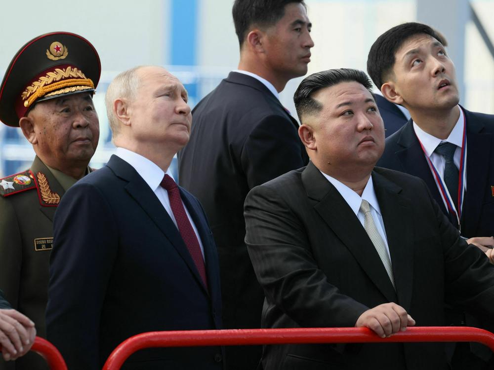 In this pool photo distributed by Sputnik agency, Russian President Vladimir Putin and North Korea's leader Kim Jong Un visit the Vostochny Cosmodrome in the Amur region on Wednesday.