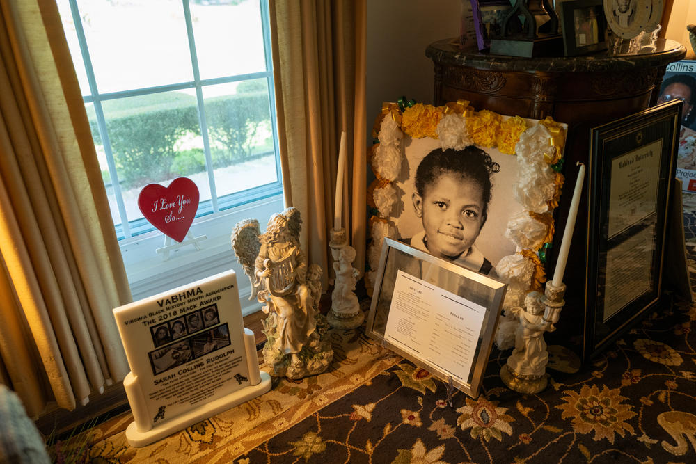 A photo of Addie Mae Collins and her obituary sit in her sister Sarah Collins Rudolph's home.